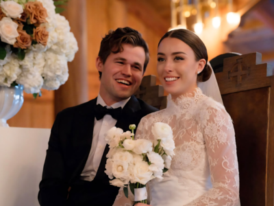 Magnus Carlsen with his wife Ella after achieving freestyle chess milestone