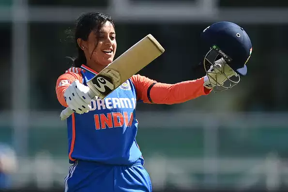 Smriti Mandhana celebrates her T20I century against England.
